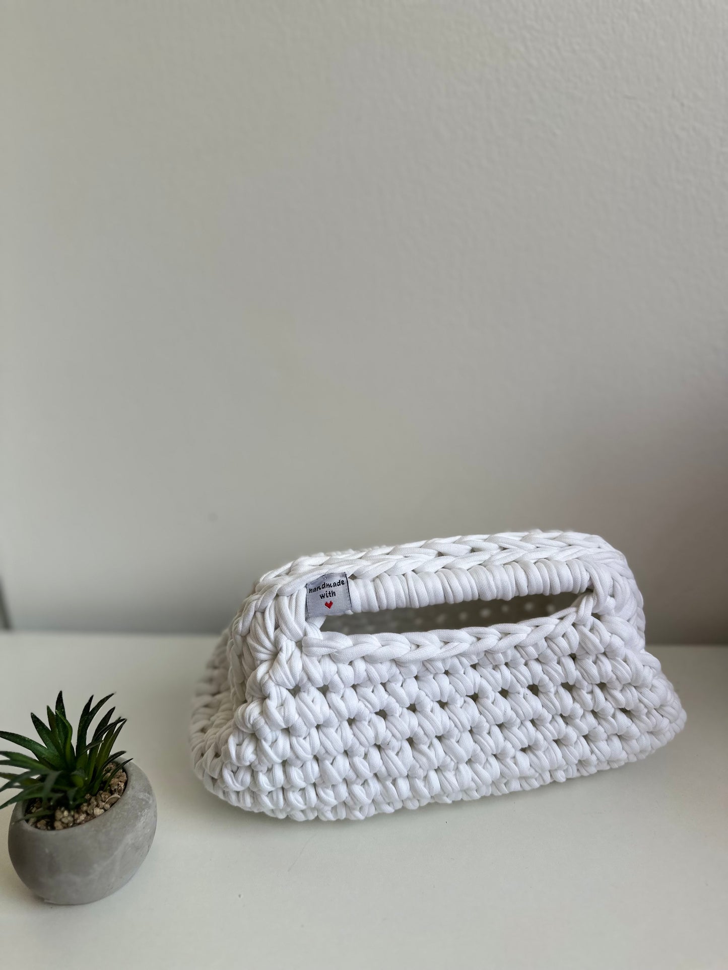 Clutch uncinetto con manico