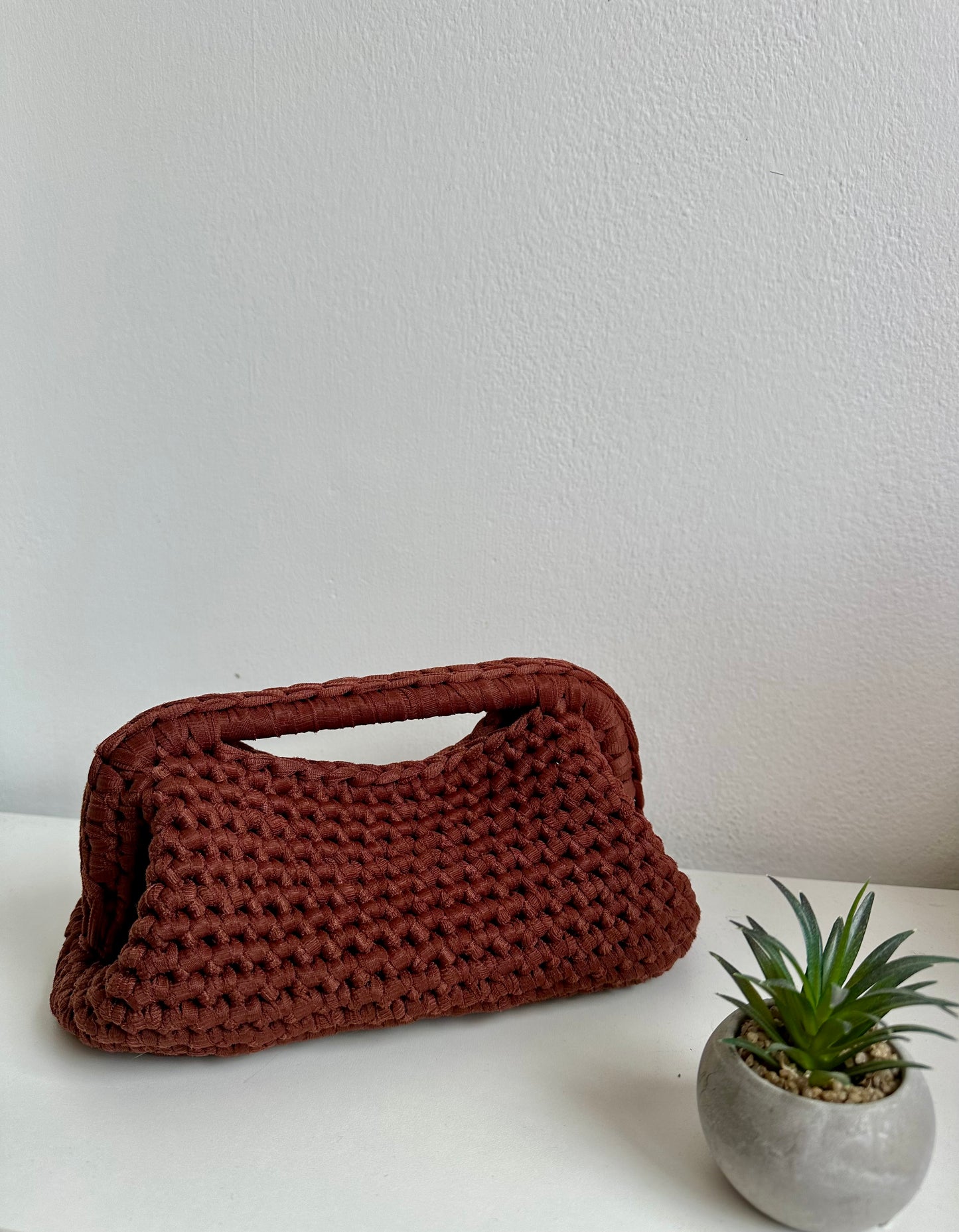 Clutch uncinetto con manico